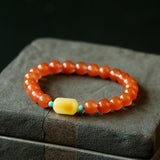 Sukhazen Natural Liangshan Red Agate Round Bead Bracelet